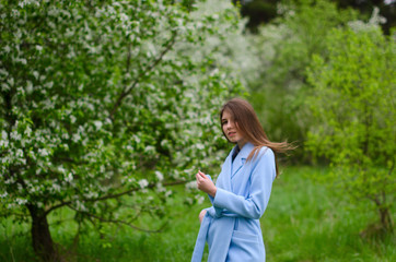 beautiful girl in a blooming Park