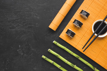 Flat lay sushi arrangement with copy space