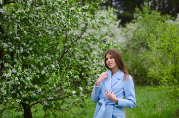 beautiful girl in a blooming Park