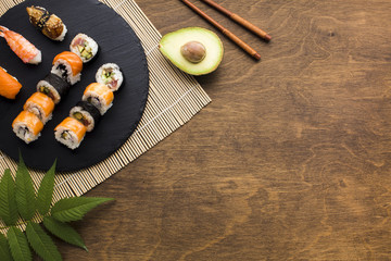Flat lay sushi frame with copy space