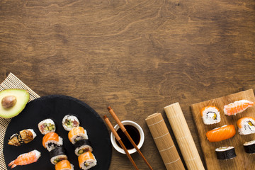 Flat lay sushi arrangement with copy space