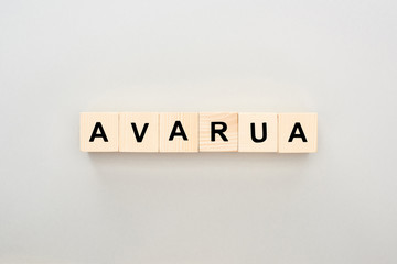 top view of wooden blocks with Avarua lettering on grey background