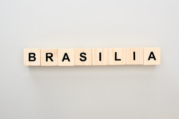 top view of wooden blocks with Brasilia lettering on grey background