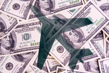 money background from 100 dollar bills and shadow from an airplane - concept photo
