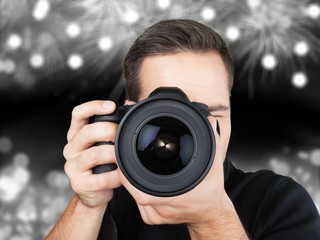 Male Photographer with Camera on  background