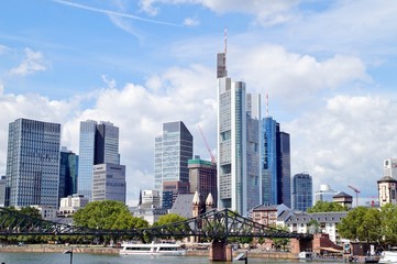 view of the river Main with the european city skyline and financial centre of Frankfurt. Skyscraper...