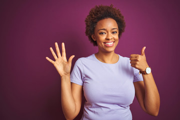 Young beautiful african american woman with afro hair over isolated purple background showing and pointing up with fingers number six while smiling confident and happy.
