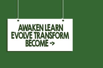 Fototapeta premium Writing note showing Awaken Learn Evolve Transform Become . Business photo showcasing Inspiration Motivation Improve Hanging board message communication open close sign green background