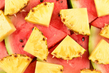 Pineapple and watermelon slices background.