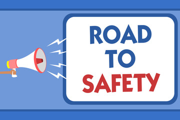 Text sign showing Road To Safety. Conceptual photo Secure travel protect yourself and others Warning Caution Man holding megaphone loudspeaker speech bubble message speaking loud