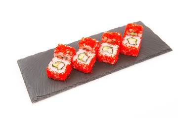 Japanese seafood sushi, roll on shale food board on white background Healthy and tasty food.