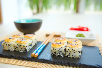 Hot Roll with Cream Cheese. Deep Fried Salmon outside. Salmon Fried Maki Sushi Healthy and tasty food.