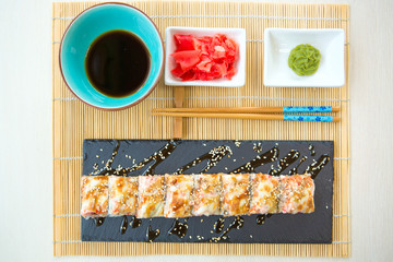 Hot Roll with Cream Cheese. Deep Fried Salmon outside. Salmon Fried Maki Sushi Healthy and tasty food.