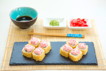 Sushi roll sushi with fish, cream cheese and vegetables. Sushi menu. Japanese food Healthy and tasty food.