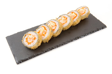 Japanese seafood sushi, roll on shale food board on white background Healthy and tasty food.