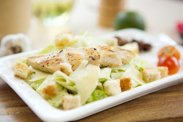 Homemade Vegetable salad with chicken and cheese on table Healthy and tasty food.