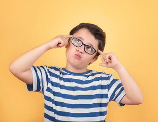 Portrait of thoughtful child with eyeglasses