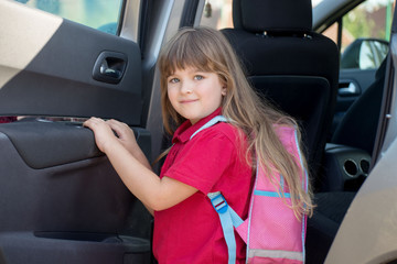 Back to school .Cute cheerful schoolgirl going school