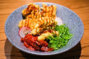 vegetarian food vegetable crispy avocado mushroom don tempura green wakame on japanese rice