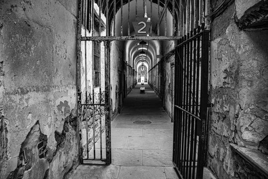 Prison corridor with cells on both sides