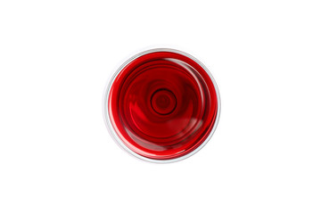 Glass with red wine isolated on white background, top view