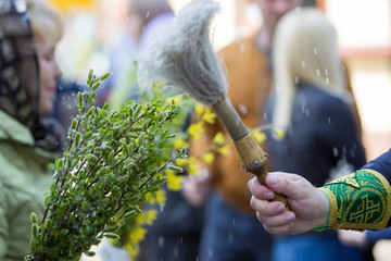 Palm Sunday. Willow and veil with holy water
