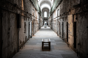 Prison corridor with cells on both sides