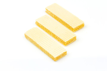 Crispy cheese flavored wafer snack isolated on white background.