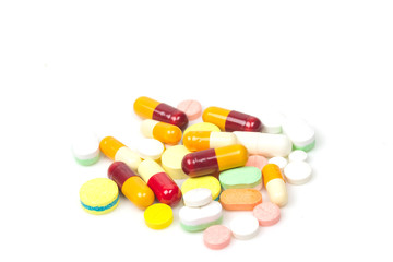 Obraz na płótnie Canvas Colorful medicine pills isolated on white background.