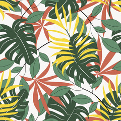 Trend seamless pattern with colorful tropical leaves and plants on a delicate background. Vector design. Jungle print. Floral background. Printing and textiles. Exotic tropics. Summer design.