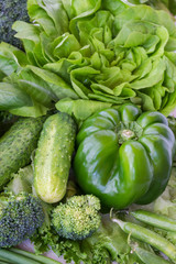 Healthy green vegetables: broccoli, lettuce, onions and peppers