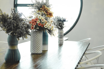 flower plant in flowerpot decorating in cafe restaurant