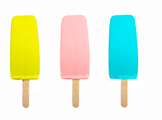 Three multi-colored ice cream on a stick on a white background