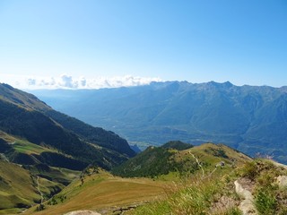 Obraz premium Nature, meadows and peaks that characterize the landscape of the Italian Alps in Val di Susa, near the town of 