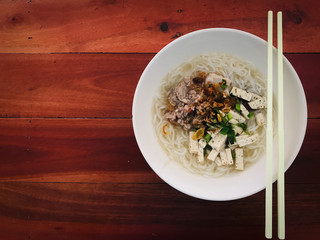 Delicious of Vietnamese noodle soup .on Wooden table..