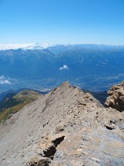 Nature, meadows and peaks that characterize the landscape of the Italian Alps in Val di Susa, near...