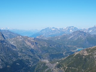 Fototapeta premium Nature, meadows and peaks that characterize the landscape of the Italian Alps in Val di Susa, near the village of 