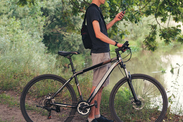 Obraz premium Young male cyclist in the Park