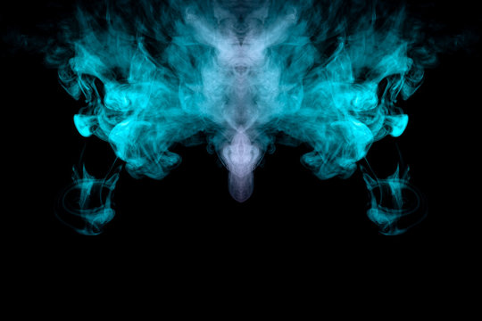 Mystical creature, a ghost in the form of clouds of smoke from green and pink on a black background. Print for clothes.