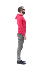 Naklejka premium side view. modern trendy guy in red jacket.