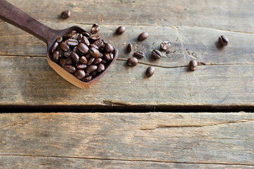 Coffee Beans in a Wooden Scoop