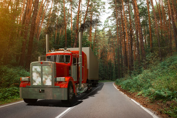 Fototapeta na wymiar Red truck 3d on a road