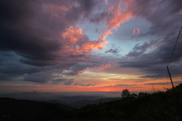 Sunset stains the Clouds of Golden and Pinkish Colors