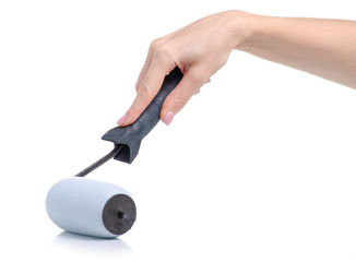 Paint roller build in hand on white background isolation