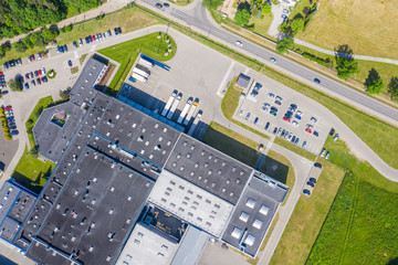 Aerial view of the distribution center, drone photography of the industrial logistic zone.