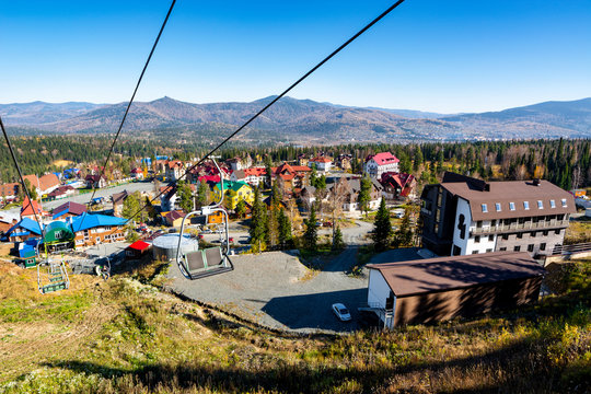 Beautiful view of mountain resort. A small town among the mountains.