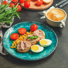 Breakfast snack, tasty food (pate, toast, tomato, corn, egg, coffee). top view. food background. copy space