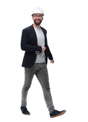 in full growth. male architect confidently stepping forward