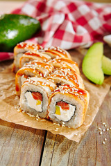 Salmon and Smoked Eel Sushi Roll with Pickled Daikon