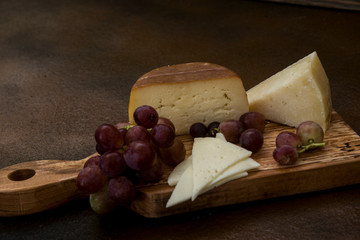 Grapes and cheese taste like kiss, still life